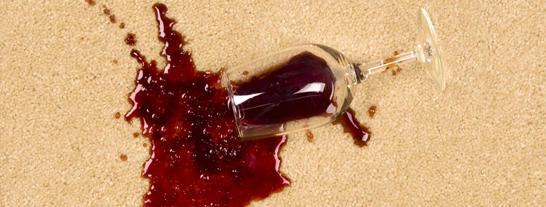 This image shows a spilled wine on a carpet.