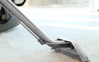 This image shows a vacuum to clean a carpet.